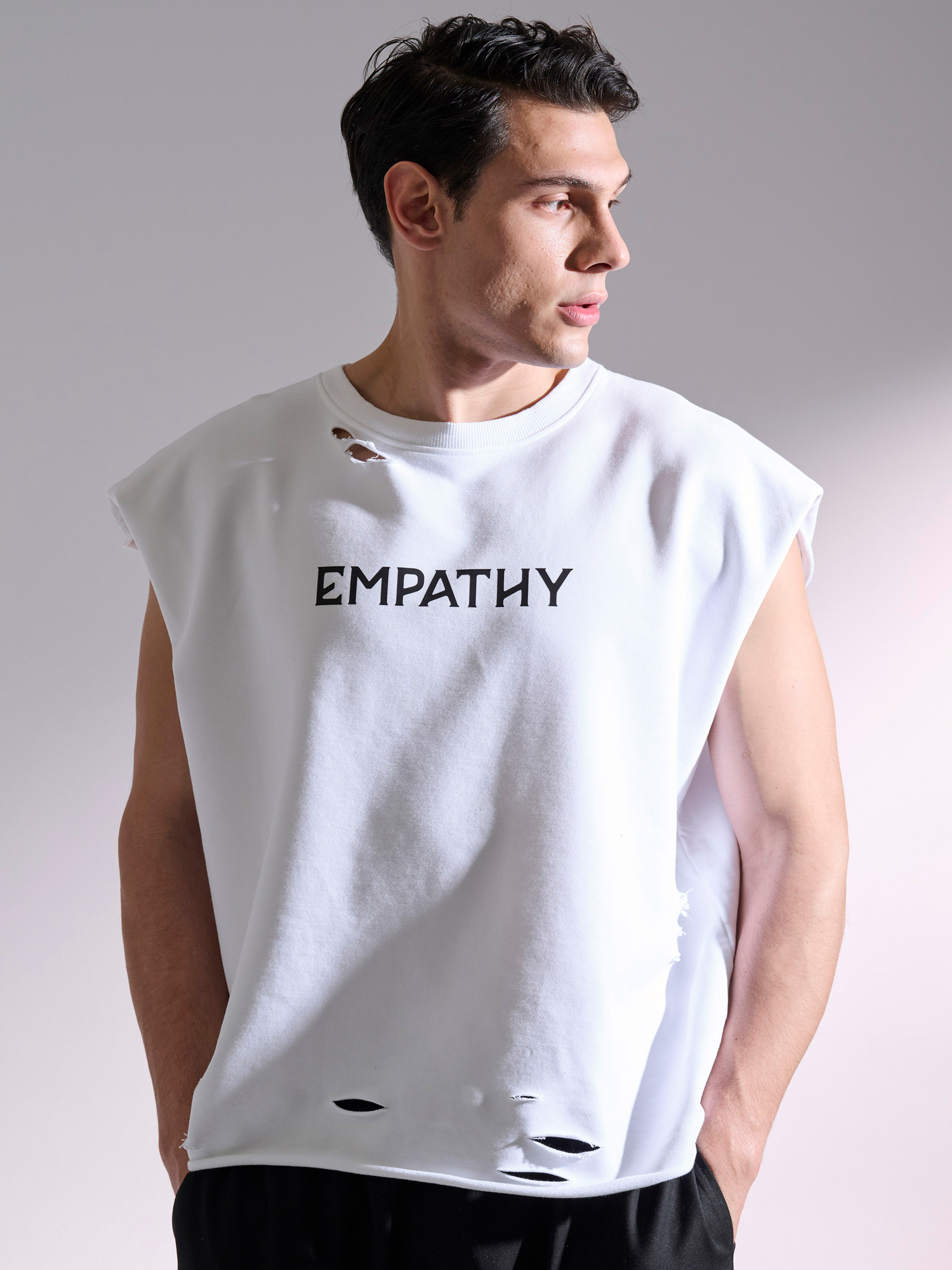 Empathy ripped off sleeveless sweater 5016